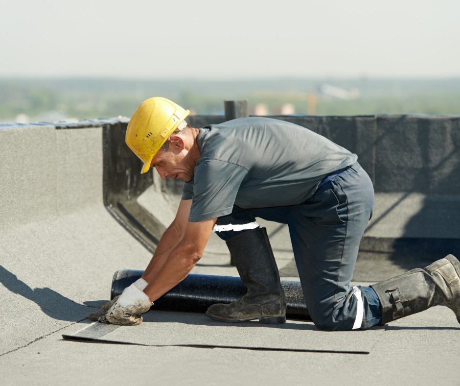 Man Fixing Commercial Roof