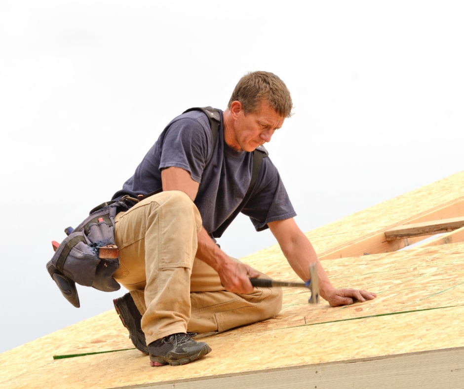 Man Fixing Roof